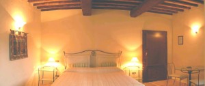 one bedroom of tuscan rental villa