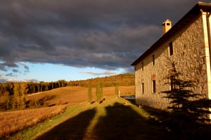 Tuscan farmhouse in the autumn, at sunset