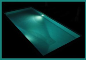 villa tuscany exlusive pool illuminated in the night